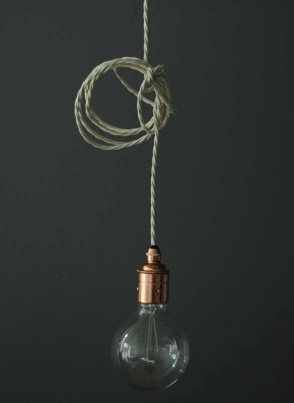A filament light bulb, lampholder and braided flex 