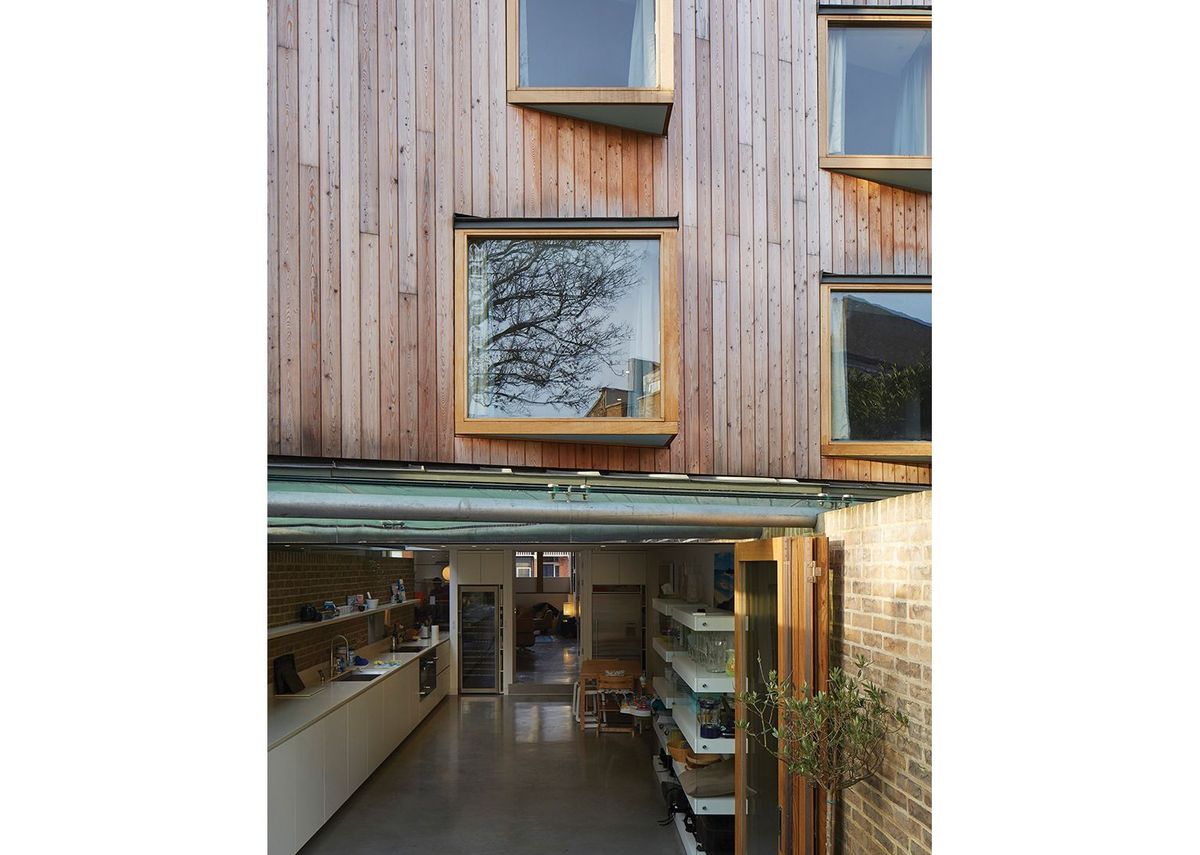 as-on-the-front-the-kitchen-has-layers-of-openness-with-a-canopy-and-folding-doors-for-different-conditions
