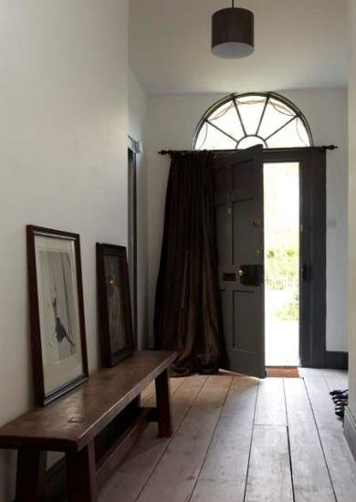 Light walls and dark woodwork in hallway Light walls and dark woodwork in hallway